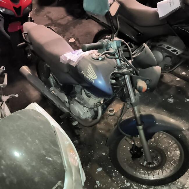 thumb <div style="text-align: justify;">HONDA CG 150 TITAN ESD 2005 
Placa: DNG3737 
LORENA-SP 
Ano/Mod: 2005/2005 
Cor: Azul 
Chassi: 9C2KC08205R813924 
Motor: KC08E25813924 
RENAVAM: 00852585438.</div>